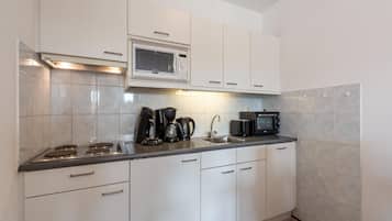 Elite Apartment, 2 Bedrooms | Private kitchen | Fridge, microwave, oven, dishwasher
