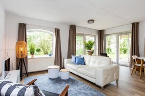 Apartamento luxo, 2 quartos | Sala de estar