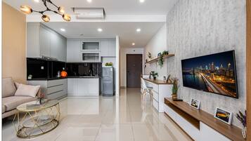 Superior Apartment, 1 Bedroom, City View | Living area | 35-inch TV with cable channels