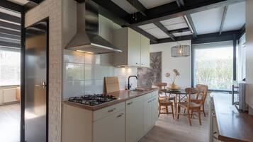 Elite Bungalow, 2 Bedrooms | Private kitchen | Fridge, microwave, dishwasher, coffee/tea maker