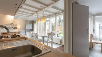 Deluxe Bungalow, 3 Bedrooms | Private kitchen | Fridge, microwave, stovetop, dishwasher