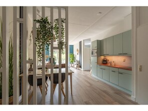 Classic Apartment, 2 Bedrooms | Private kitchen | Fridge, microwave, stovetop, dishwasher