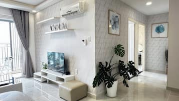Superior Apartment, 2 Bedrooms, Kitchen, City View | Living area | 35-inch TV with cable channels