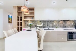 Superior Apartment, 3 Bedrooms, Balcony, City View | Private kitchen | Fridge, microwave, stovetop, cookware/dishes/utensils - Modern Apartment - Garden Gate (Ho Chi Minh City)