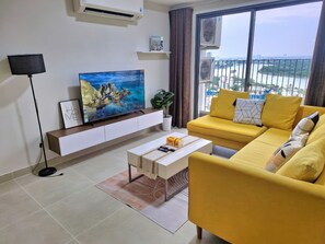 Appartement Deluxe, 2 chambres, cuisine, vue ville | Coin séjour