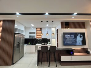Superior Apartment, 3 Bedrooms, Balcony, City View | Private kitchen | Fridge, microwave, stovetop, rice cooker