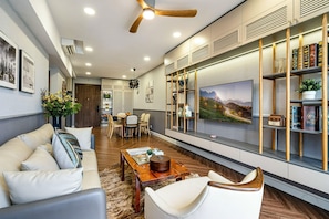 Superior Apartment, 2 Bedrooms, Balcony, City View | Living area | 35-inch TV with cable channels