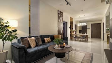 Superior Apartment, 3 Bedrooms, Kitchen, City View | Living area | 35-inch TV with cable channels