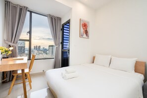 Minibar, desk, laptop workspace, blackout curtains - The RiverGate Apartments & Condo Saigon (Ho Chi Minh City)