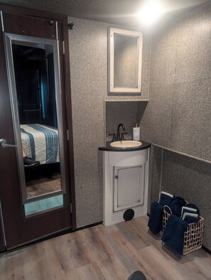 Hair dryer, towels, soap, shampoo