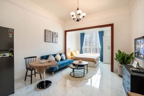 Superior Studio, 1 Queen Bed, Kitchen, City View | Living area | TV - GEM Residence - The Manor Central (Ho Chi Minh City)