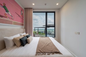 Superior Apartment, 2 Bedrooms, Kitchen, City View | Minibar, desk, laptop workspace, soundproofing