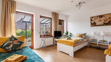 2 slaapkamers, een strijkplank/strijkijzer, gratis wifi, beddengoed