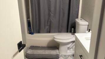 Hair dryer, towels, soap, shampoo