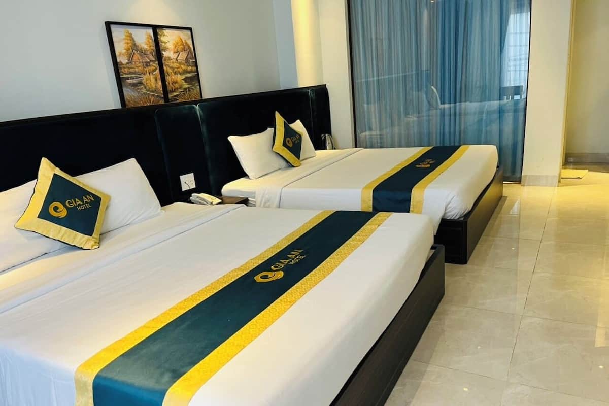 Family Double or Twin Room, 2 Queen Beds, Kitchenette, Beach View | Desk, blackout curtains, soundproofing, iron/ironing board