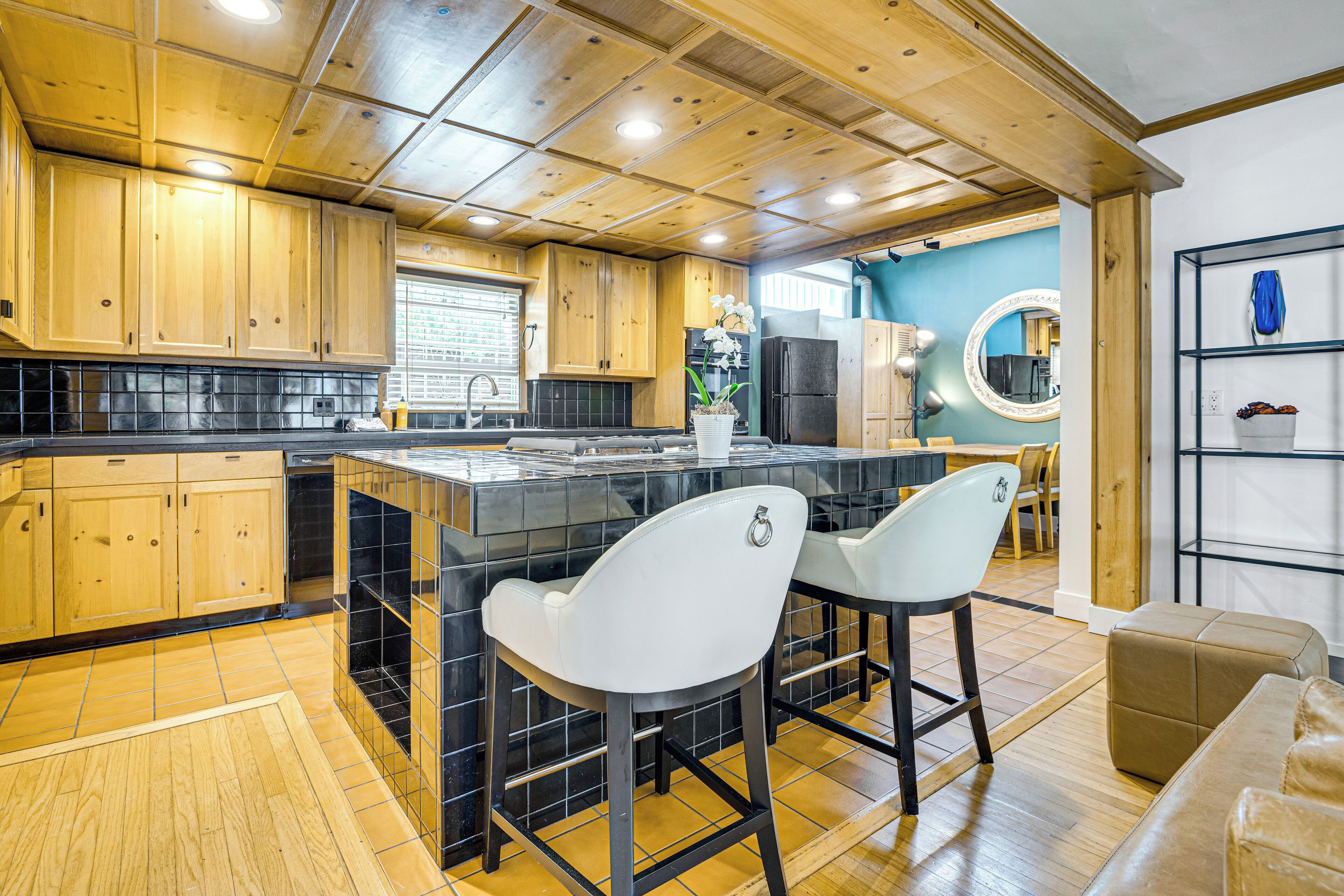 Fridge, stovetop, dishwasher, coffee/tea maker