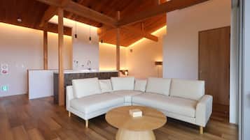 65-inch flat-screen TV with cable channels