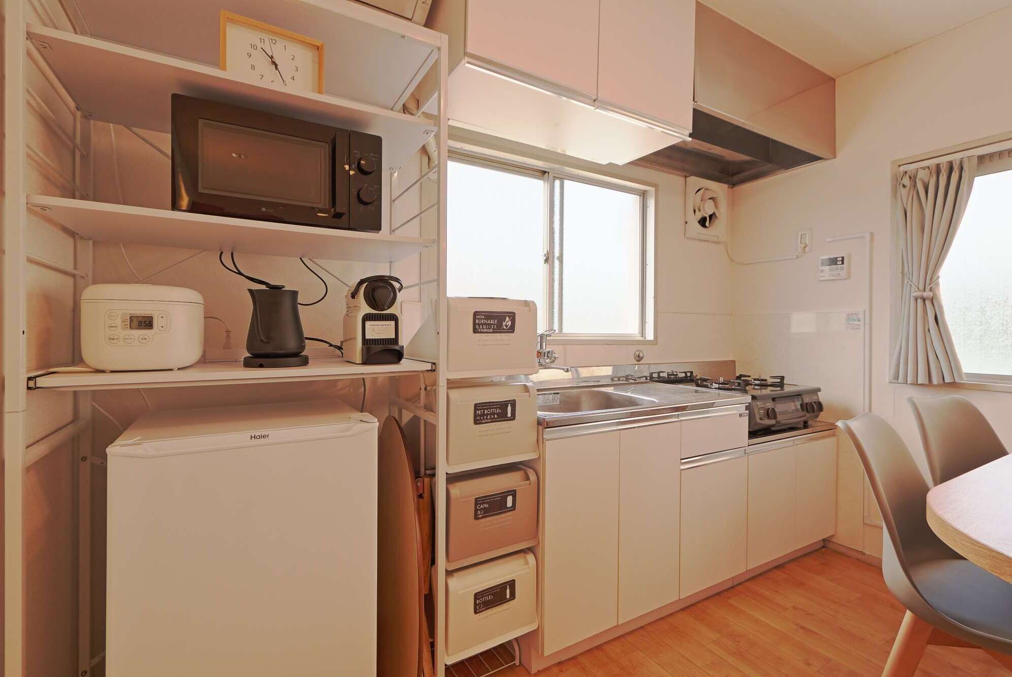 Fridge, microwave, stovetop, coffee/tea maker