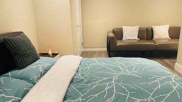 1 bedroom, desk, iron/ironing board, travel crib