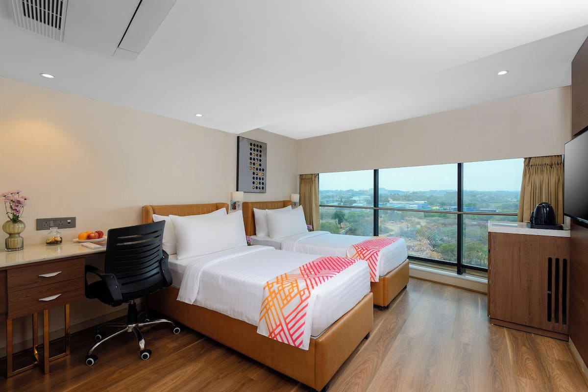 Superior Twin Room | Minibar, in-room safe, iron/ironing board, free WiFi