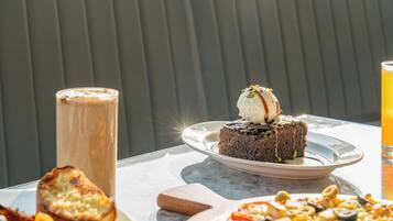 Daily buffet breakfast (INR 250 per person)