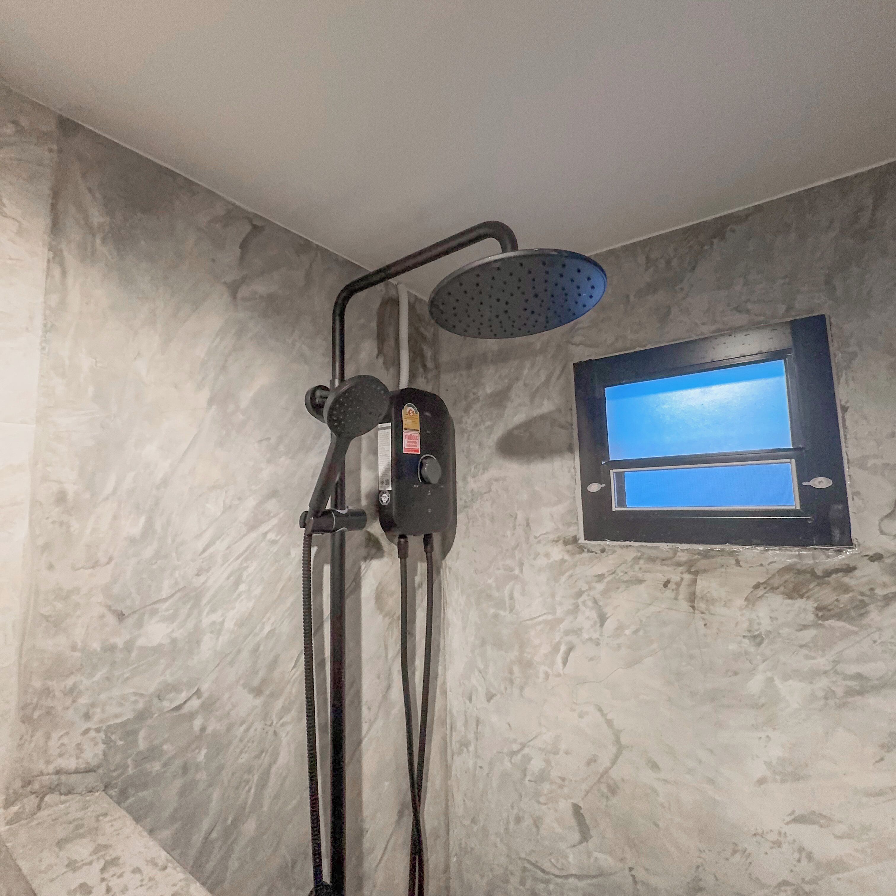 Standard Studio, Balcony, City View | Bathroom | Shower, hair dryer, towels, soap