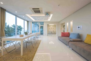 Villa, Ocean View, Beachside | Living area | 100-inch Smart TV with cable channels, Netflix, streaming services - 500m2 Busan Ocean view private Let house (Busan)
