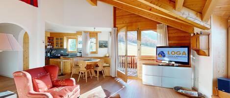 Televisión, chimenea, estéreo