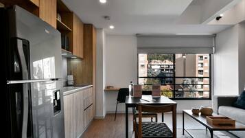 Fridge, microwave, stovetop, coffee/tea maker