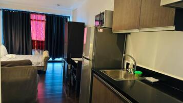 1 chambre, fer et planche Ă repasser, Wi-Fi, draps fournis