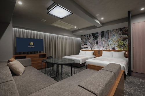 Deluxe Family Room | In-room safe, iron/ironing board, free WiFi, bed sheets