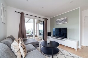 Apartment, Balcony | Living area | 37-inch TV with cable channels, Netflix, streaming services - The Colindale Luxury Apartment (London)