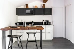 Design Room, 1 Queen Bed, Garden View | Private kitchen | Espresso maker, coffee/tea maker, electric kettle, toaster