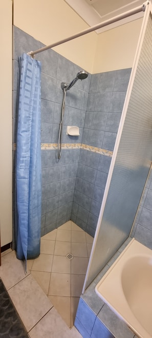 Hair dryer, towels, soap, shampoo