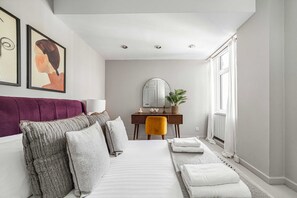Apartament bàsic | 1 dormitori, planxa i posts de planxar i roba de llit