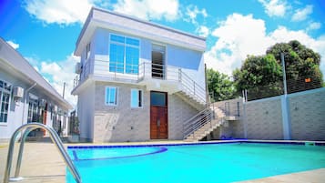 Outdoor pool, sun loungers, lifeguards on site