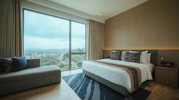 Deluxe Room, 1 King Bed, Mountain View | Minibar, in-room safe, desk, iron/ironing board