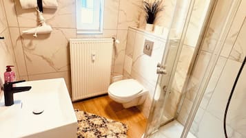 Hair dryer, towels, soap, toilet paper