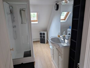 Shower, hair dryer, towels, soap