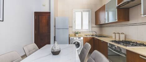 Apartment | Private kitchen | Electric kettle, high chair