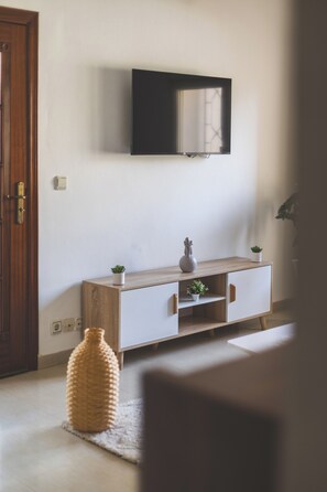 Apartment | Living area | 37-inch TV with cable channels, Netflix, streaming services