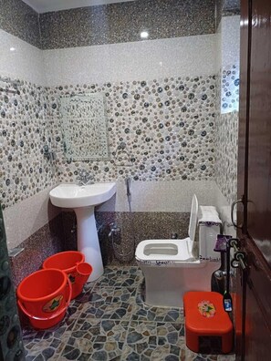 Standard Single Room | Bathroom | Shower, bidet, soap - Navmint's Nami Homes By GRB (Patna)
