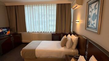 Standard Room, Non Smoking, City View | Hypo-allergenic bedding, minibar, free WiFi, bed sheets