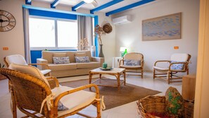 Basic Apartment, Sea View | Living area