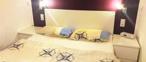 2 habitaciones y ropa de cama