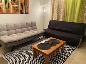 Living area - Oceanview Apartment with Expansive Terrace, Full Kitchen, and Modern Amenities (Portimão)