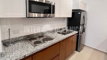 Fridge, microwave, coffee/tea maker, toaster