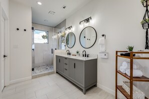 Shower, hair dryer, towels