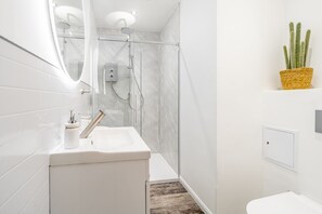 Eco-friendly toiletries, hair dryer, towels, soap