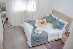 Classic Apartment, 2 Bedrooms, Kitchen, Courtyard View | Desk, laptop workspace, free cribs/infant beds, free WiFi - Hotêl MEGA4 (Mohammedia)